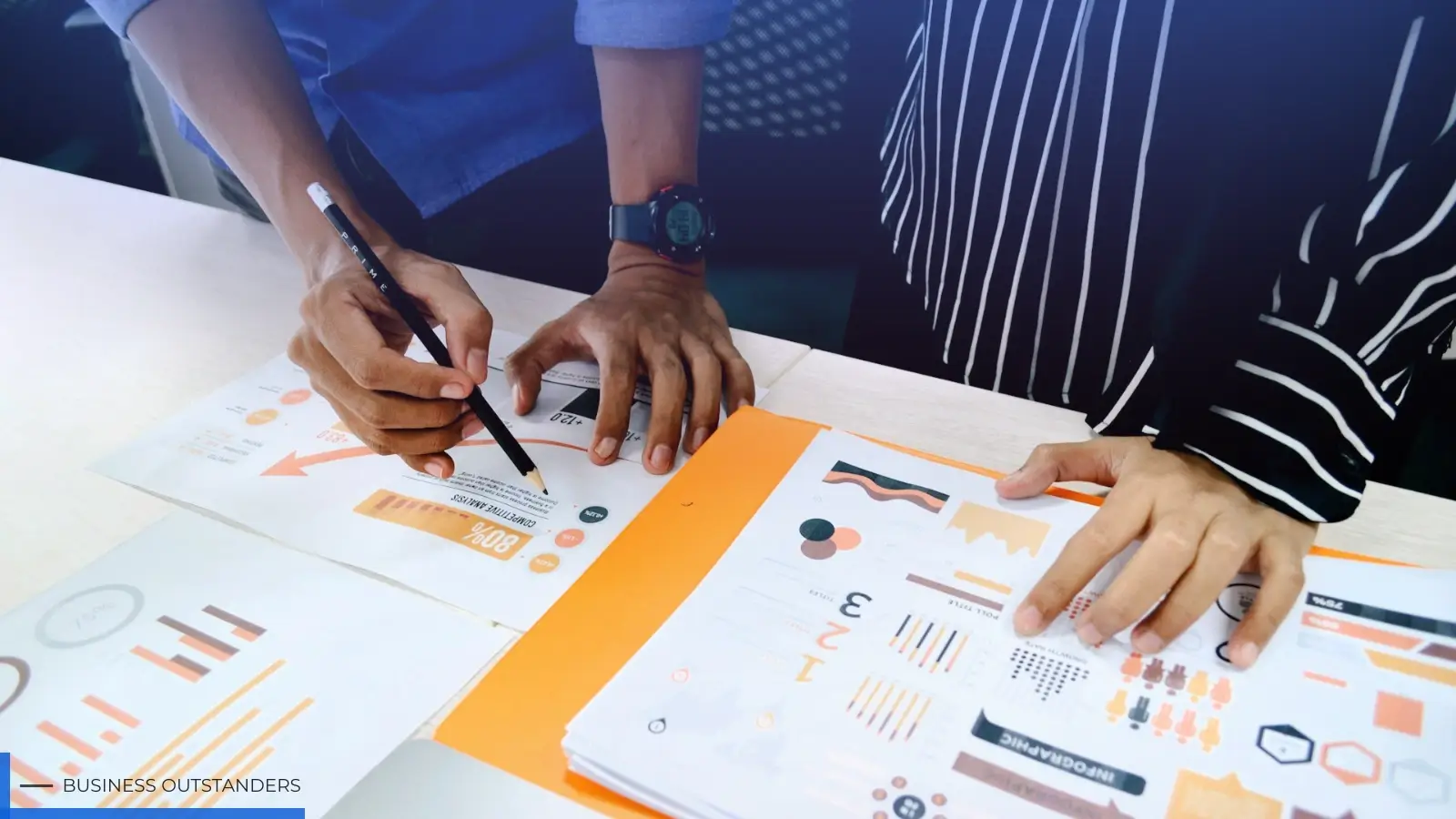 Startup founder reviewing new product development strategy and market research data