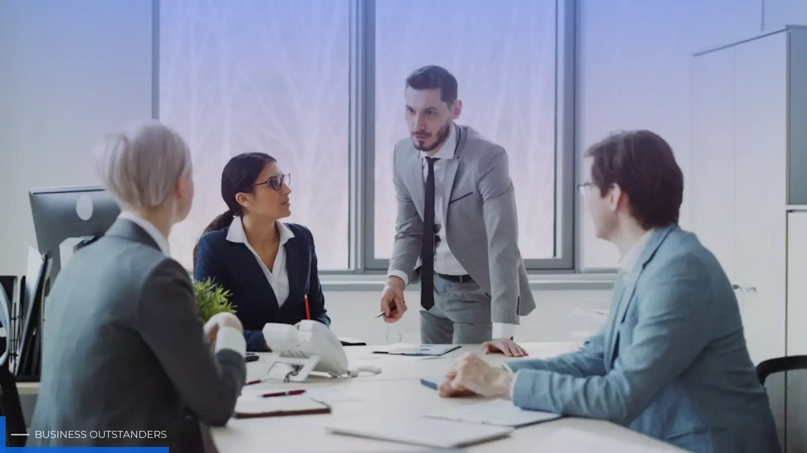 Business leaders discussing corporate governance structure and accountability in a boardroom meeting