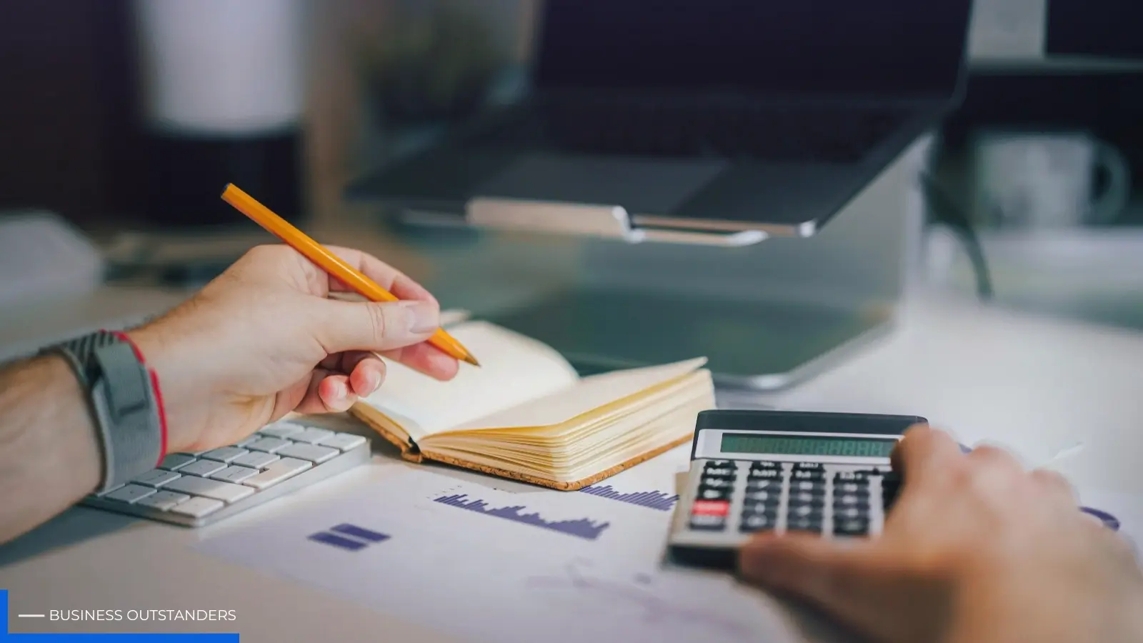 Business owner reviewing small recurring expenses and hidden costs in financial records