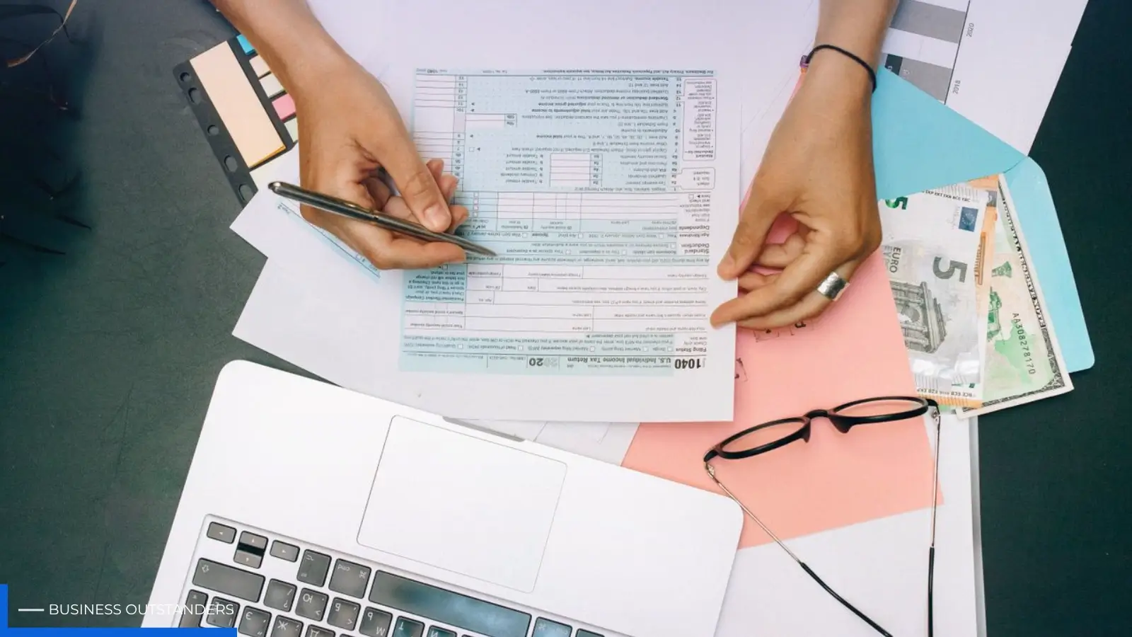 Expat reviewing income tax filing documents and residency rules in Thailand