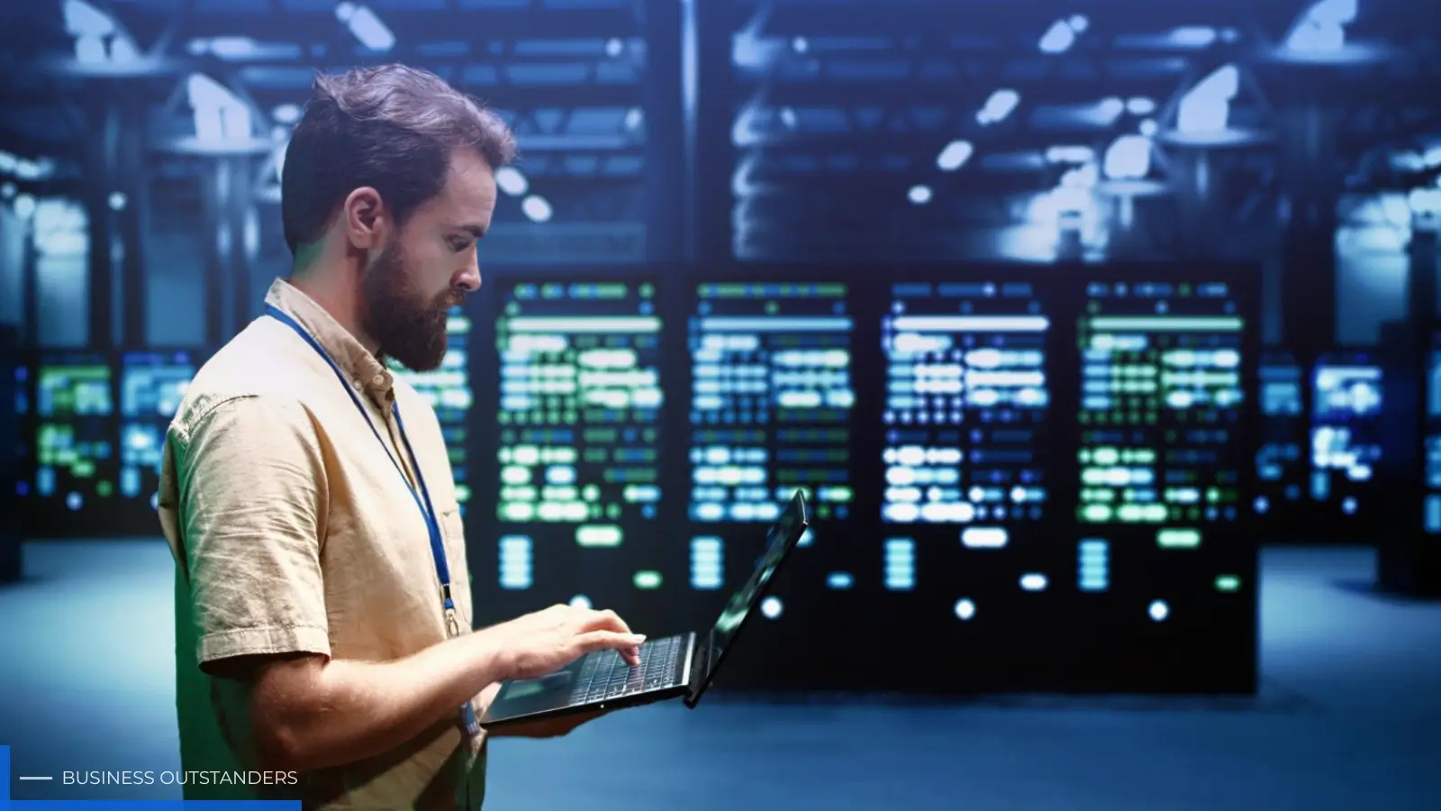 IT professional setting up a reliable business network with routers and switches in a server room