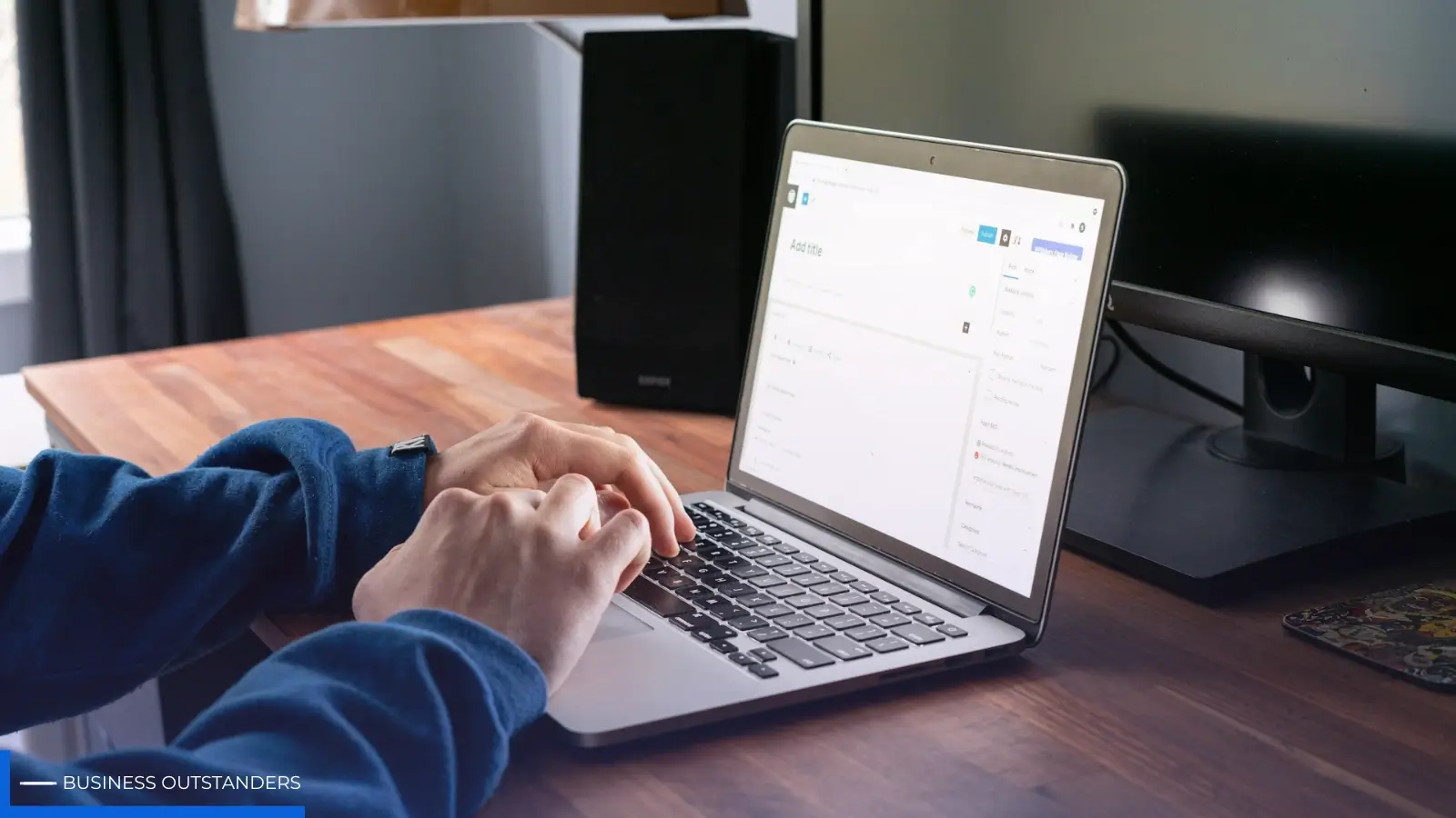 Person identifying warning signs of a scam website on a laptop screen