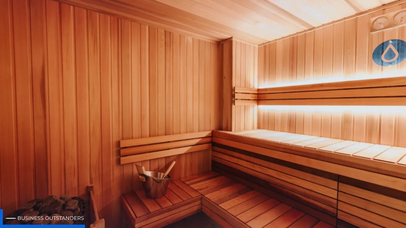 Person relaxing in a traditional wooden sauna in Manly for recovery and wellness
