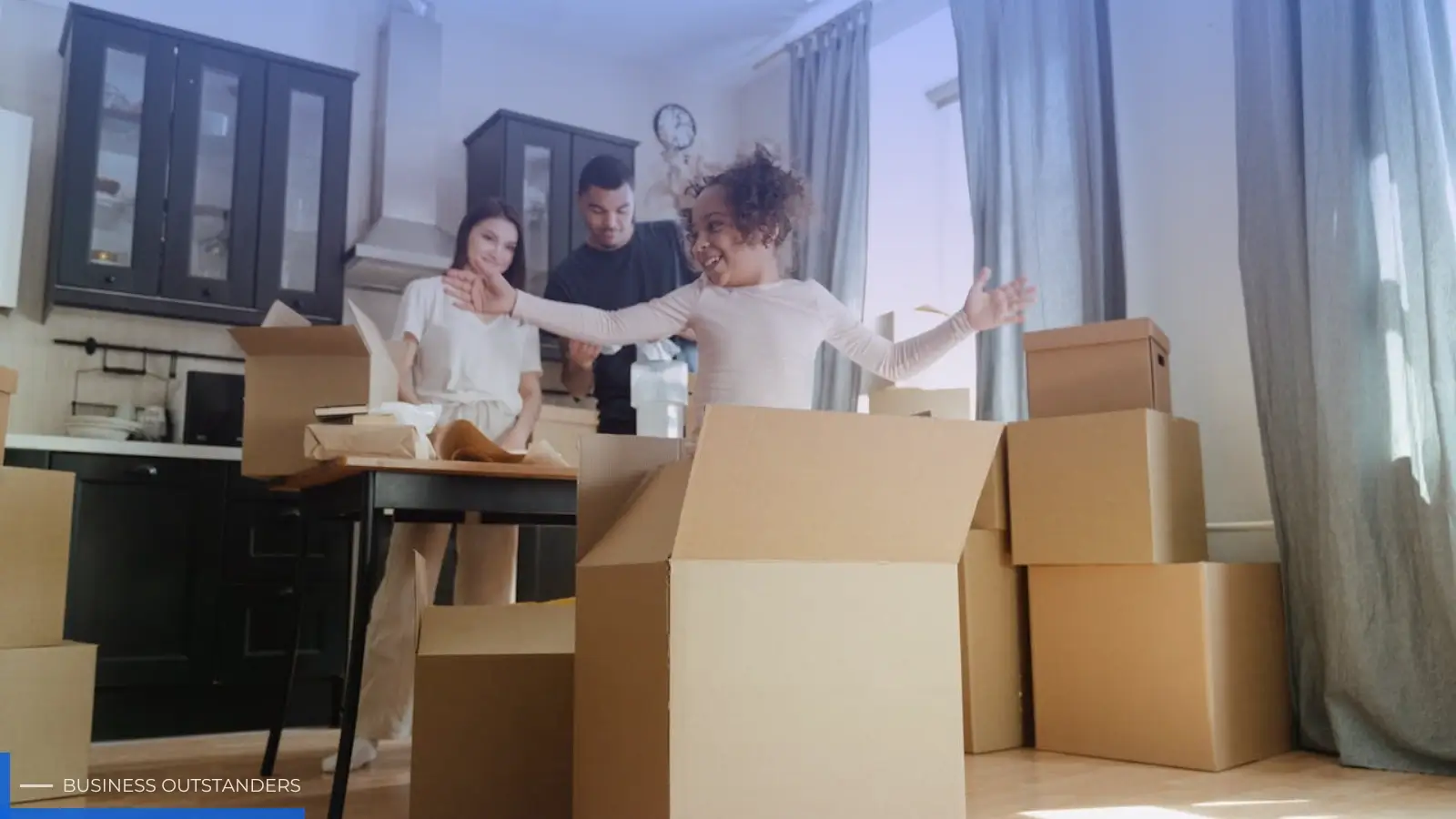 Person unpacking boxes and organizing a new home after moving day