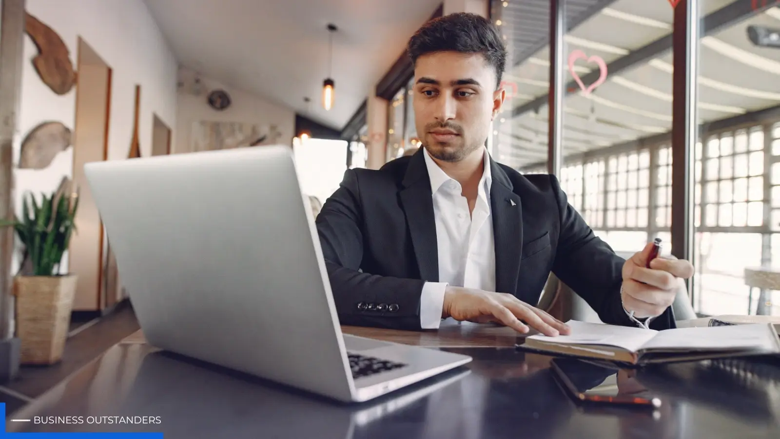 Professional developing high-income skills on a laptop to build financial freedom