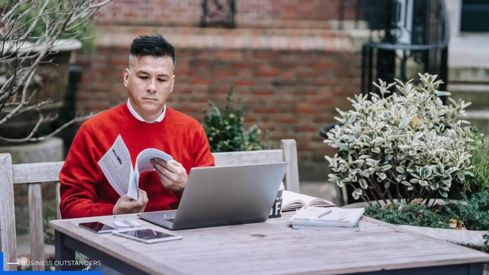Small business owner reviewing website cost options on a laptop