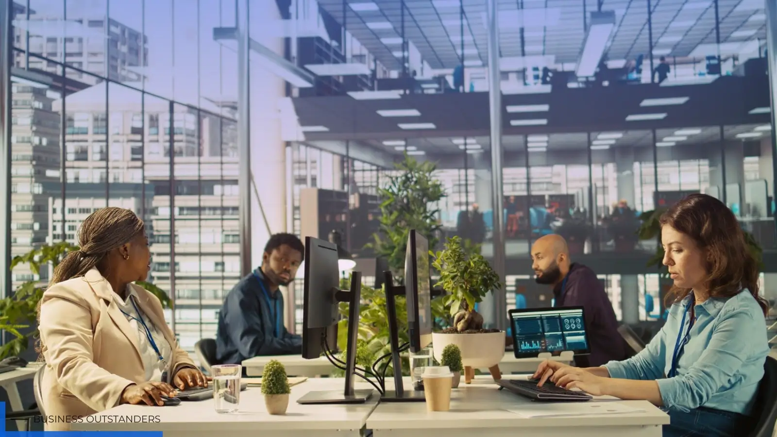 Team of engaged employees collaborating in a modern workplace environment