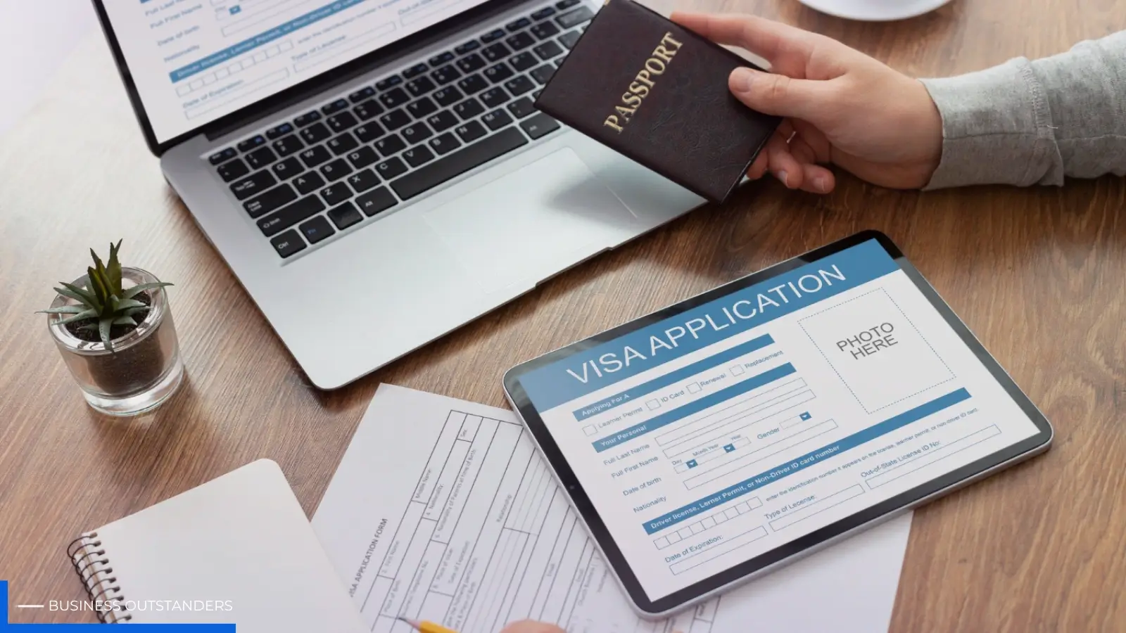 Traveler organizing visa application documents including proof of onward travel and flight reservations
