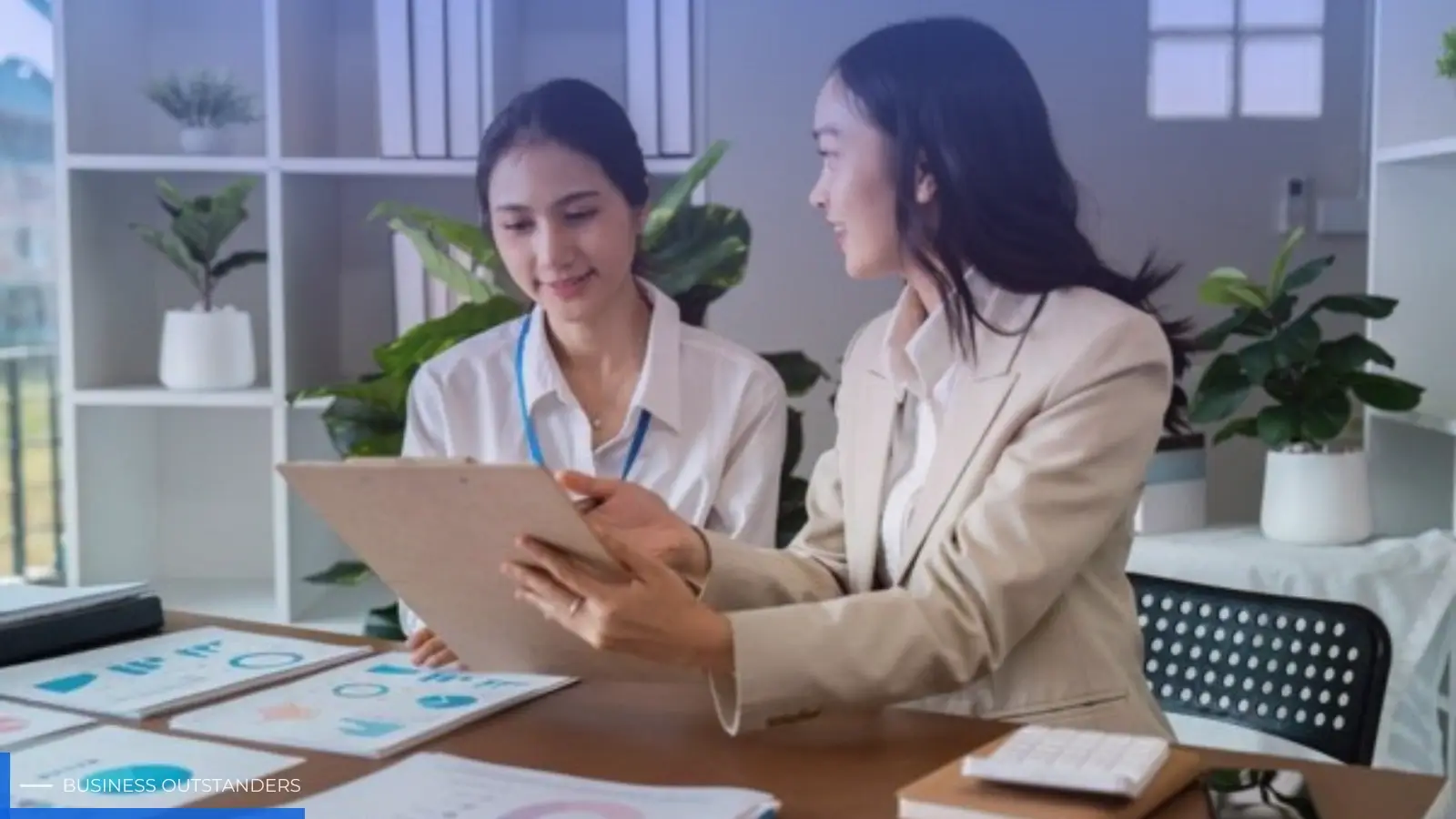 Business professionals collaborating on unified strategy and marketing frameworks in 2026