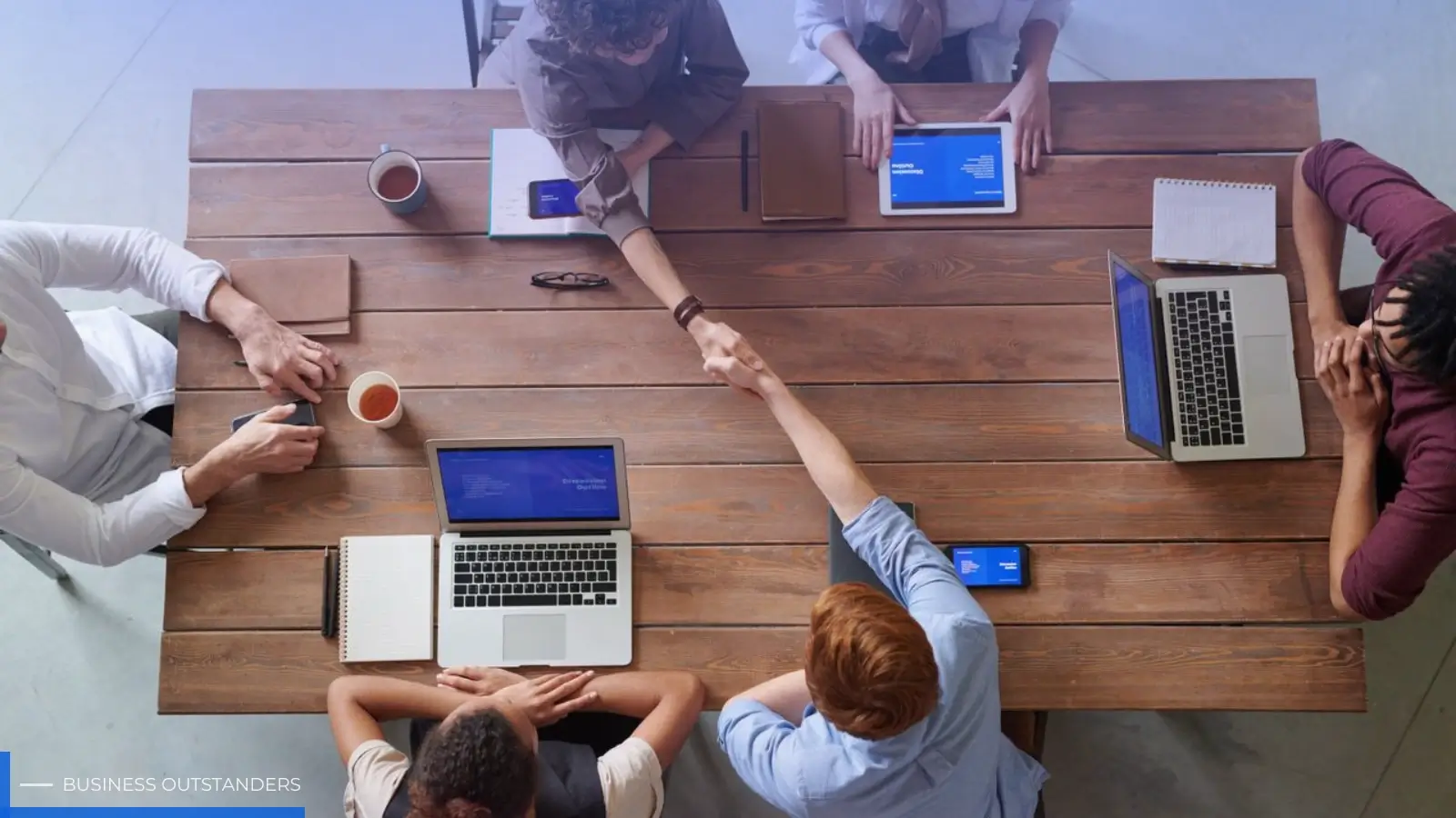 Business team collaborating with local IT company for long-term technology partnership and cybersecurity support
