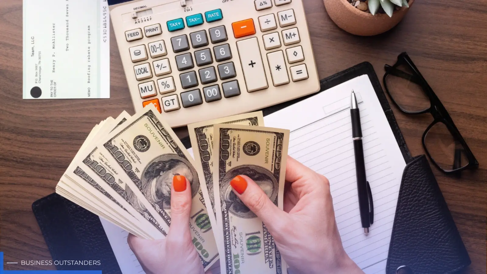 Business owner reviewing payroll compliance documents and employee payment records