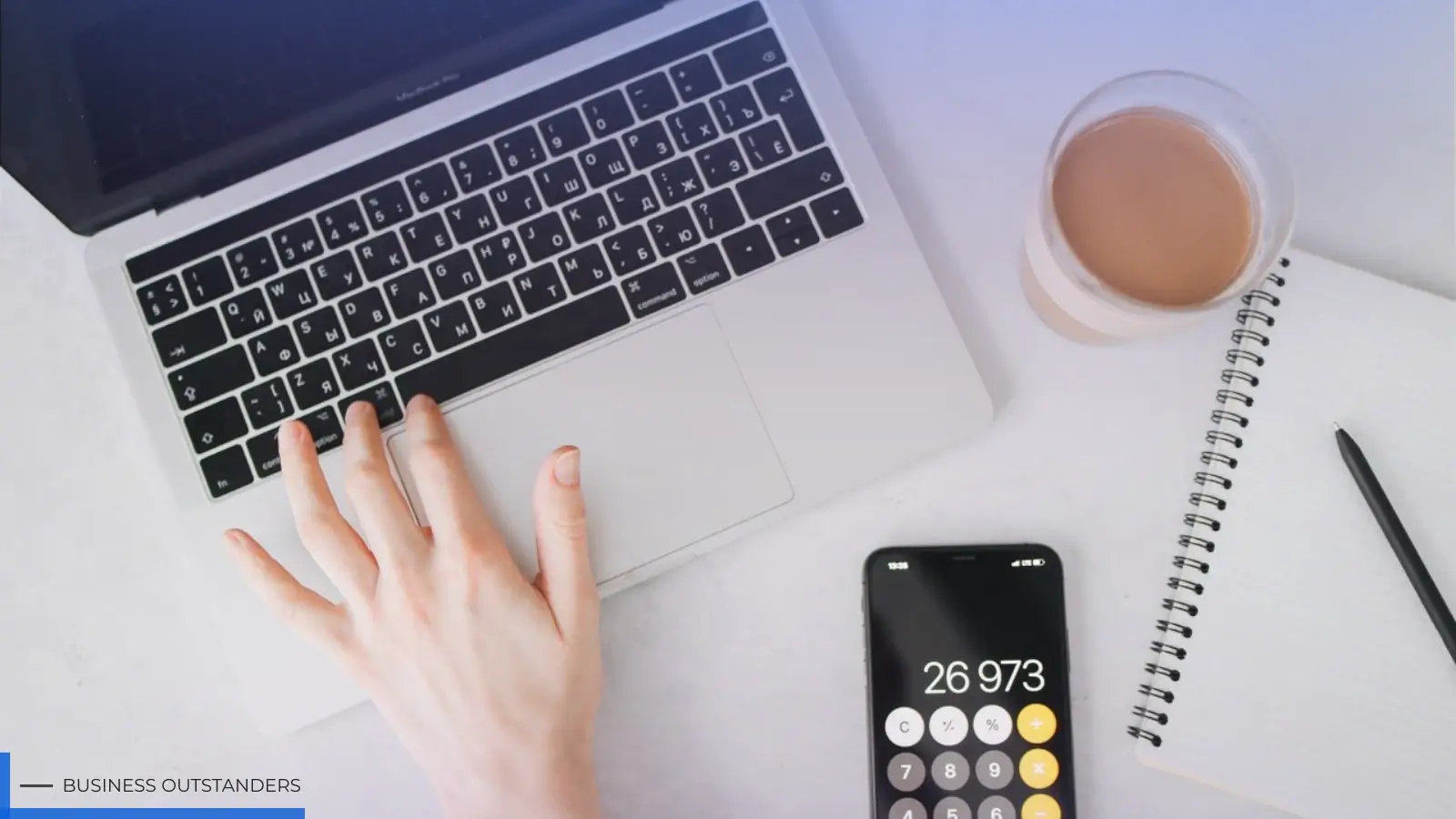 Person using an online vehicle insurance calculator to estimate car insurance premium on a laptop